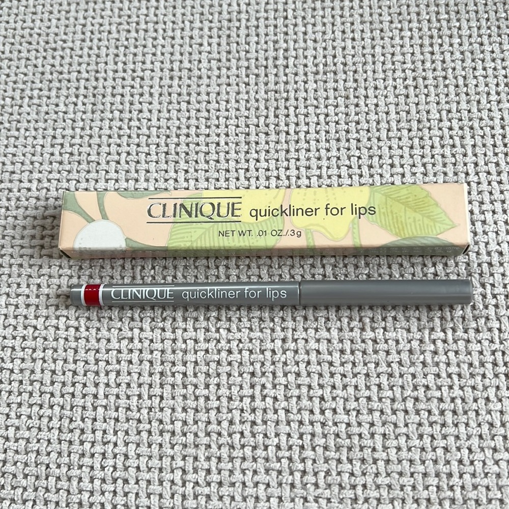 Clinique lip liner. quicker for lips lip pencil.  Perfect poppy NIB
